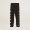 Schwarze Leggings für Mädchen mit weißen Sternen an den Seiten