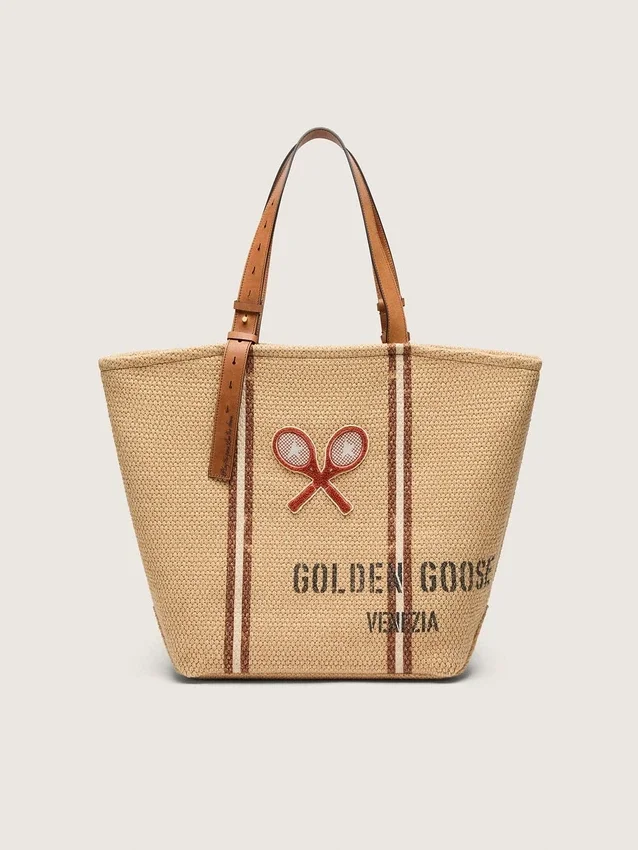 24,7 Tote aus naturbelassener Raffia und braunem Leder mit goldenen Metalldetails