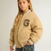 Beigefarbene Fleece-Bomberjacke für Kinder
