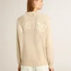 Beiger Damenpullover mit „Golden“-Schriftzug auf dem Rücken