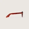 Cameron Panthos Sonnenbrille mit honigfarbenem Rahmen, Edelsteinen und blauen Gläsern