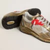 Dad-Star für Damen aus Mesh und goldfoliertem Leder mit weißem Lederstern