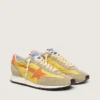 Damen-Marathon mit gelbem Nylon-Obermaterial und orangefarbenem Stern