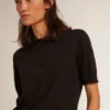 Damen-Poloshirt aus schwarzer Merinowolle