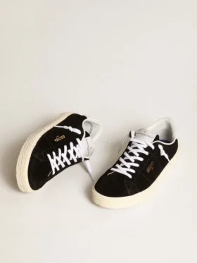 Damen-Tennisschuhe aus schwarzem Wildleder mit weißer Lederlasche an der Ferse