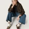 Damenmodell VCE Penstar aus Ponyfell mit Leopardenmuster und schwarzer Lederlasche an der Ferse