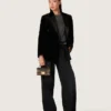 Damenhose aus schwarzem Baumwoll-Denim mit Used-Look