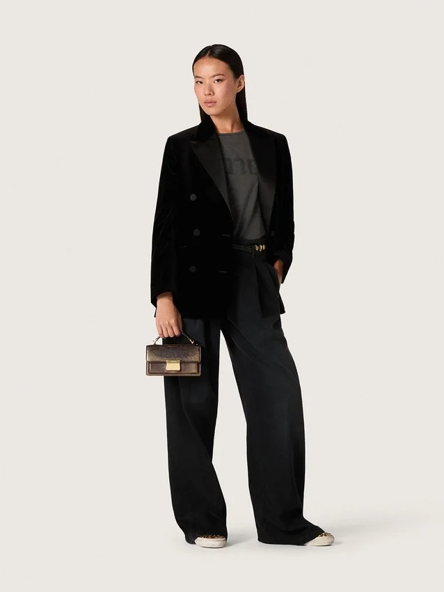 Damenhose aus schwarzem Baumwoll-Denim mit Used-Look