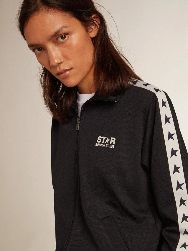 Dunkelblaues Sweatshirt mit Reißverschluss, weißem Streifen und kontrastierenden Sternen
