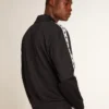 Dunkelblaues Sweatshirt mit weißem Streifen und kontrastierenden blauen Sternen