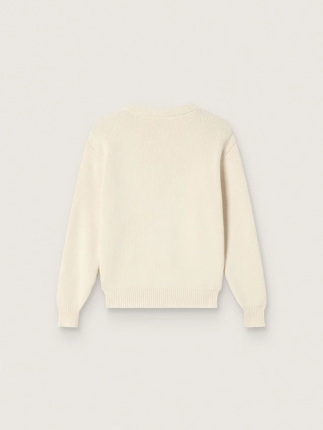Goldfarbener Mädchenpullover aus weißem Baumwollgarn mit Maskottchen-Stickerei