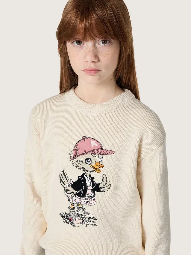 Goldfarbener Mädchenpullover aus weißem Baumwollgarn mit Maskottchen-Stickerei