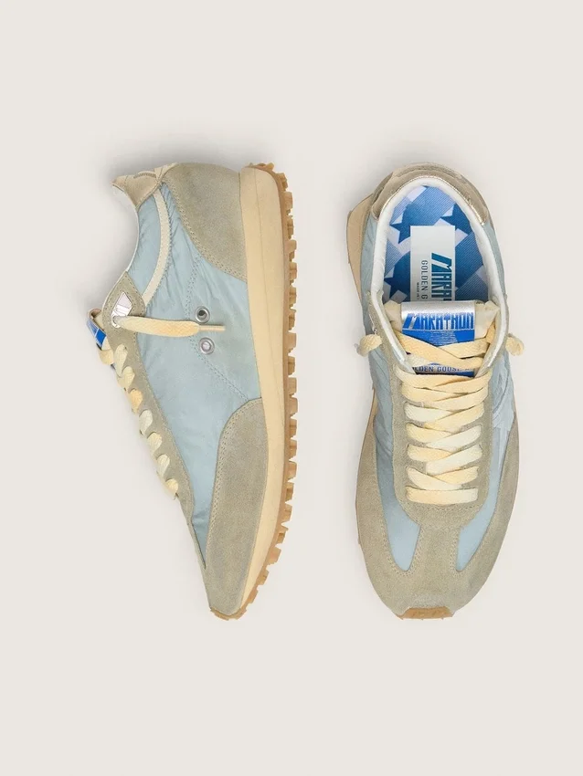 Herrenmodell „Marathon“ mit hellblauem Nylon-Obermaterial und pastellblauem Stern