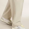 Herrenmodell „Marathon“ mit weißem Nylon-Obermaterial und silbernem Stern