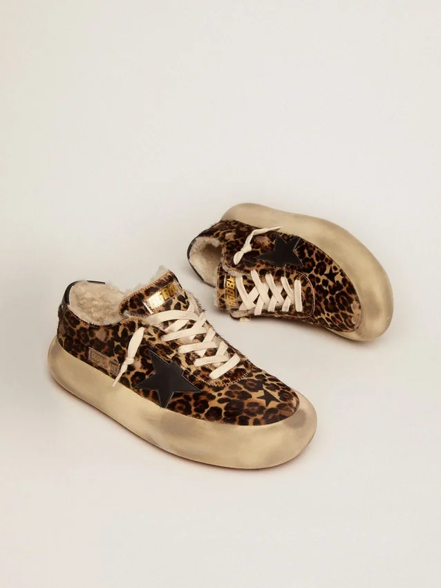 Herrenmodell „Space-Star“ aus Ponyfell mit Animal-Print und Lammfellfutter