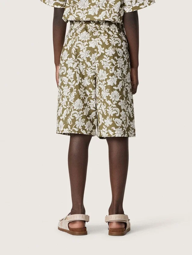 Journey Jungen-Shorts aus Baumwoll-Canvas mit grün-weißem Blumenprint