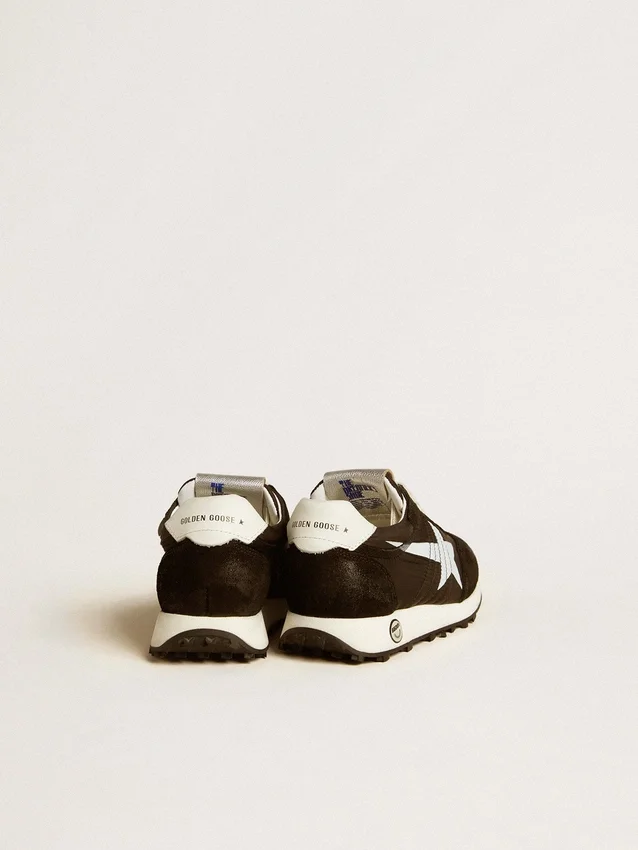 Junior-Marathon aus schwarzem Nylon mit aufgedrucktem Stern und Lederlasche an der Ferse