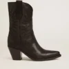 Niedrige „Wish Star“-Stiefel aus schwarzem Leder mit Ton-in-Ton-eingearbeitetem Stern