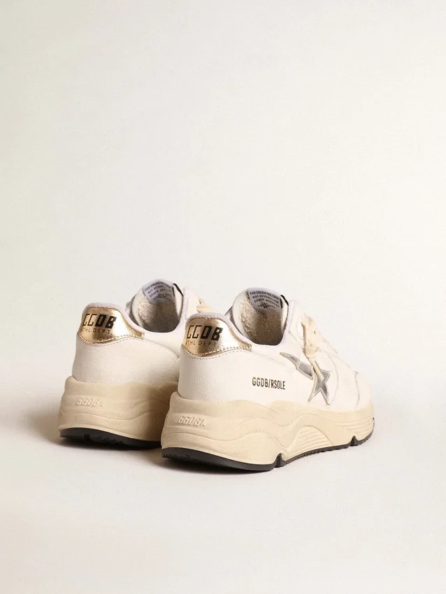 „Running Sole“ aus Nappa mit silbernem Stern und goldener Lederlasche an der Ferse