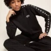 Schwarzes Damen-Sweatshirt mit Reißverschluss und weißen Sternen