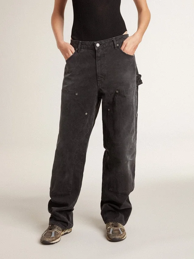 Schwarze Damenjeans aus Baumwolle im Distressed-Look mit Aufnähern auf der Vorderseite