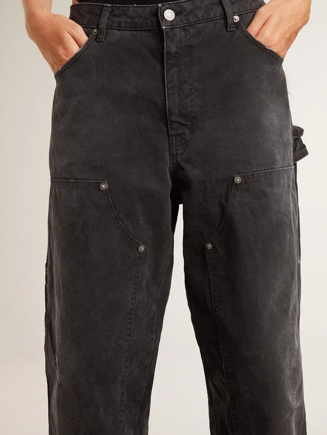 Schwarze Damenjeans aus Baumwolle im Distressed-Look mit Aufnähern auf der Vorderseite