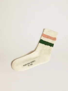 Socken in „Worn-White“-Optik mit Used-Effekten und rosa-grünen Streifen