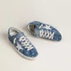 Super-Star LTD für Damen in hellblauem Denim mit weißem Lederstern und gestickten Blumen