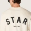Unisex-Baumwoll-Hemd „Star“ in Vintage-Weiß mit schwarzem Aufdruck auf der Rückseite