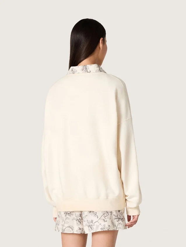 Unisex-Baumwoll-Sweatshirt „Star“ in Vintage-Weiß mit gestickten VCE-Aufnähern