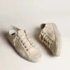 V-Star aus hellcremefarbenem Canvas mit milchweißem Lederstern