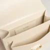 Venezia-Tasche aus butterfarbenem, geripptem Leder mit goldenen Details