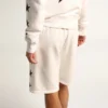 Vintage-weiße Bermuda-Shorts für Herren mit kontrastierenden schwarzen Sternen