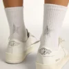 Weiße Socken mit Kristallstern auf der Rückseite