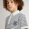Weißes Baumwoll-Polohemd für Jungen mit marineblauen Streifen und Stickerei