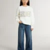 Weißes Mädchen-Sweatshirt mit mehrfarbigem goldenem Schriftzug auf der Vorderseite