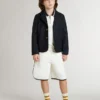 Weißes Polo-Sweatshirt für Kinder aus Baumwolle mit Stickerei auf der Brust und Aufdruck auf der Rückseite